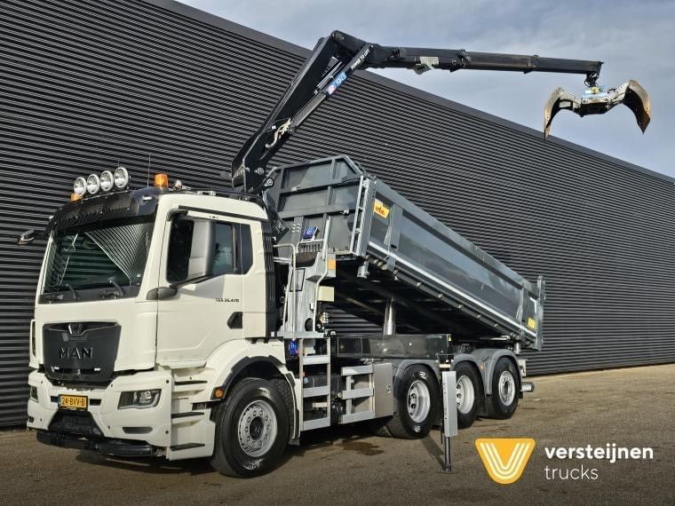 Vrachtwagenchauffeur knijperauto / kraanauto